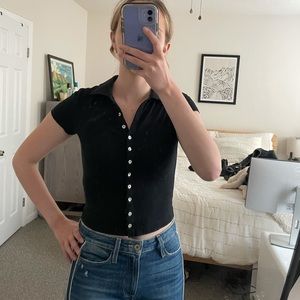 & other stories black polo w/ pearl buttons.